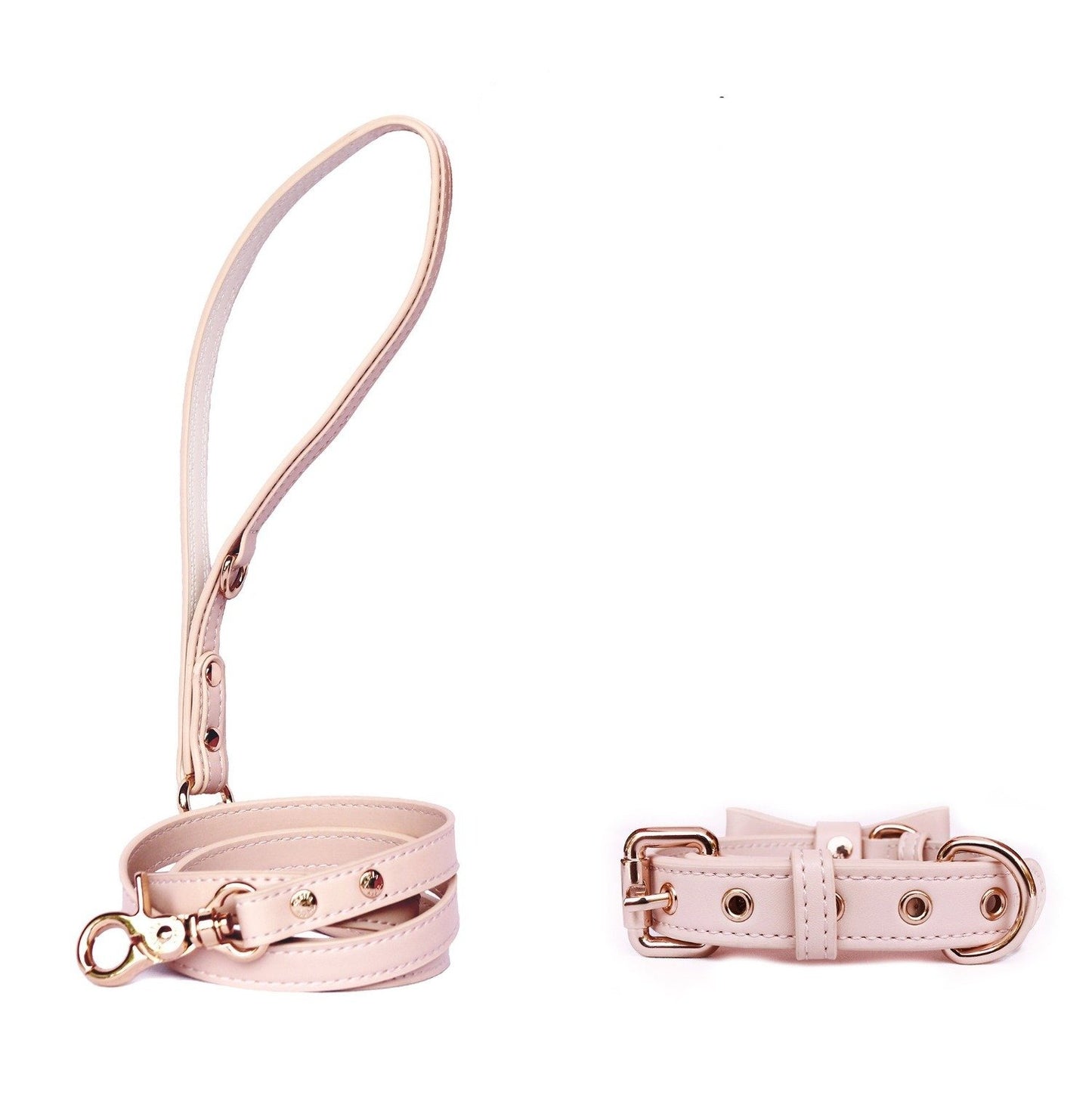 Designer dog collar with bow tie and leash poop bag holder. Designer vegan leather